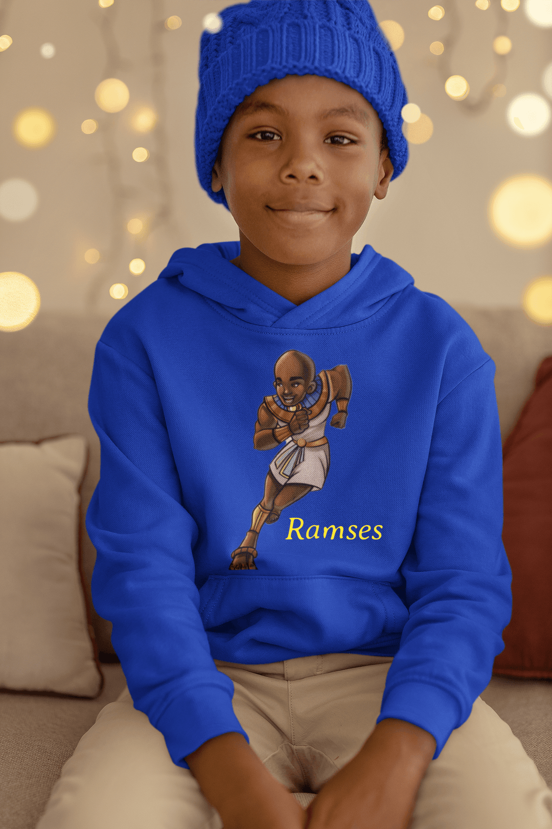 Boy wearing Blue Ramses hoodie representing strength and wisdom from TL Johnson Stories.