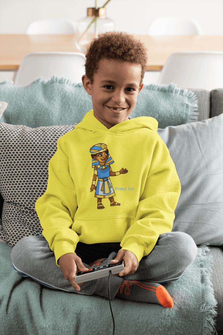 Tut hoodie from TL Johnson Stories featuring crown emblem and character name; cultural empowerment fashion for all ages.